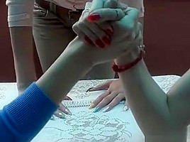 3 girls arm wrestling