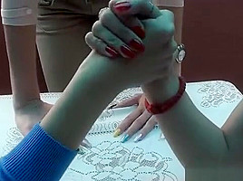 3 girls arm wrestling