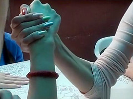3 girls arm wrestling