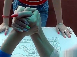 3 girls arm wrestling