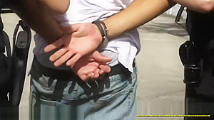 Cell phone thief hiding under a van is taken to milf cops spot