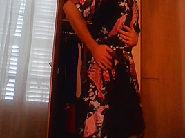 Crossdresser wearing satin robe masturbating and ejaculating all over satin