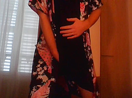 Crossdresser wearing satin robe masturbating and ejaculating all over satin