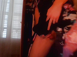 Crossdresser wearing satin robe masturbating and ejaculating all over satin