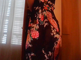 Crossdresser wearing satin robe masturbating and ejaculating all over satin