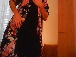 Crossdresser wearing satin robe masturbating and ejaculating all over satin