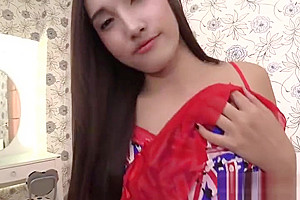 Cute slender Asian shemale carefully does that with hands