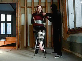 Cutie gets taped and tied to stool