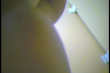 Erotic beige panty on the changing room girl