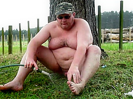 Fat man masturbates outdoors until he cums!