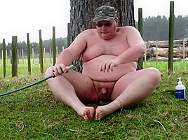 Fat man masturbates outdoors until he cums!
