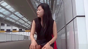 Fetish asian whore peeing in gutter