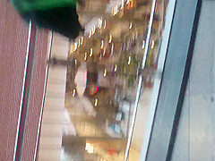Girl in thong in a shopping mall