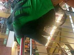 Girl in thong in a shopping mall