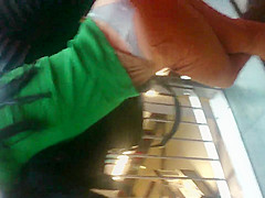 Girl in thong in a shopping mall