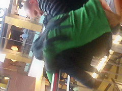 Girl in thong in a shopping mall