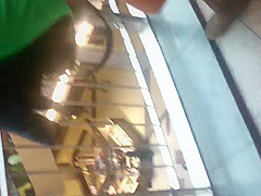 Girl in thong in a shopping mall