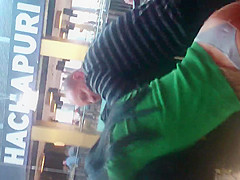 Girl in thong in a shopping mall