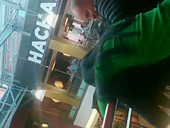Girl in thong in a shopping mall