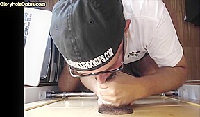Gloryhole amateur DILF sucking and tugging Black cock