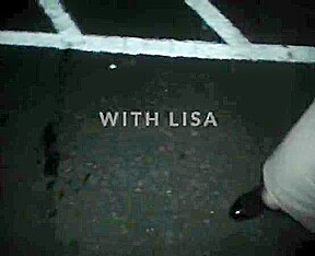 Lisa being pissed on in the car park outdoors 
