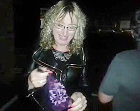 Lisa being pissed on in the car park outdoors 