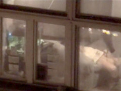 Lovely babe filmed masturbating through apartment window