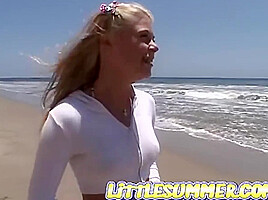 Petite teen 18+ lesbian fingered on the beach