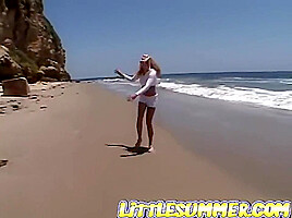 Petite teen 18+ lesbian fingered on the beach