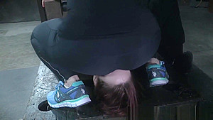 Redhead slave bent over and dominated