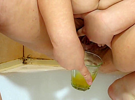 Russian Girl Pissing Into A Glass And Pours Herself Urine