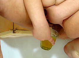 Russian Girl Pissing Into A Glass And Pours Herself Urine