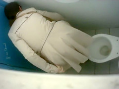 Saucy bimbos get taped urinating in the public toilet