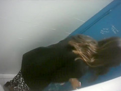 Saucy bimbos get taped urinating in the public toilet