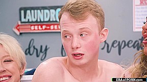 Young guy is sucked and fucks busty milfs in a laundry room